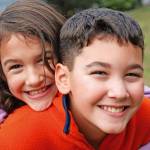 Boy and girl smiling